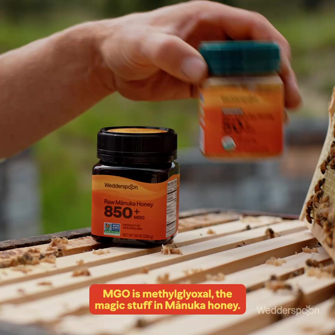Wedderspoon ad: The jar held over a hive frame.